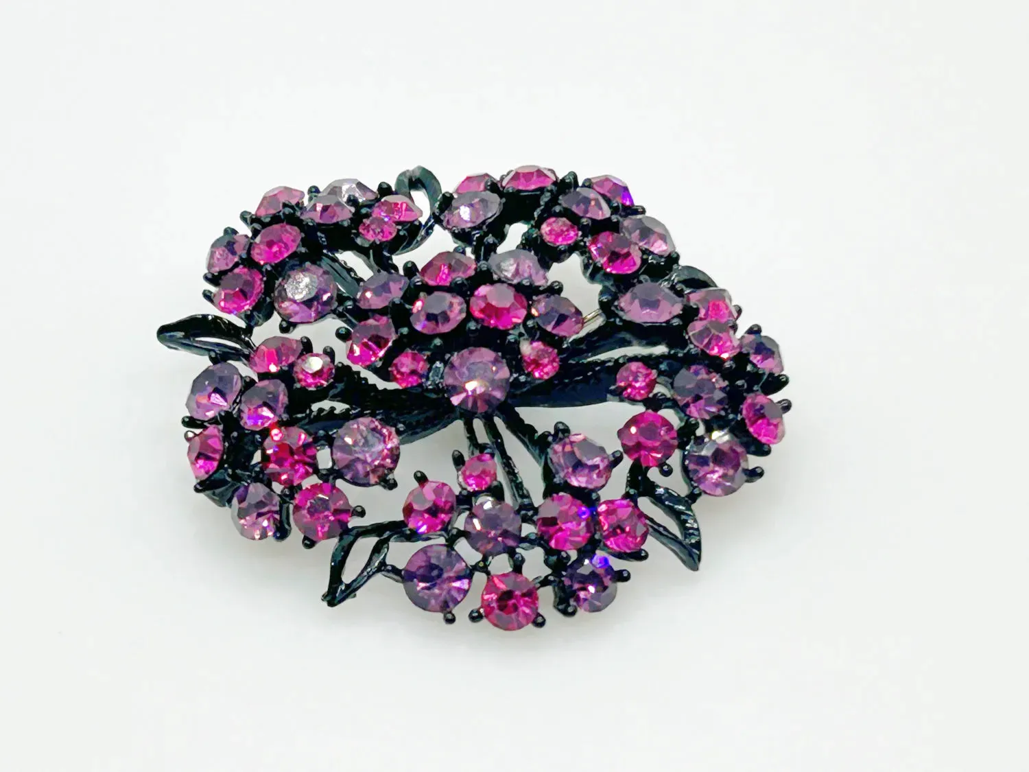 Vintage Blackened Lacy Metal Brooch with Sparkling Magenta Stones